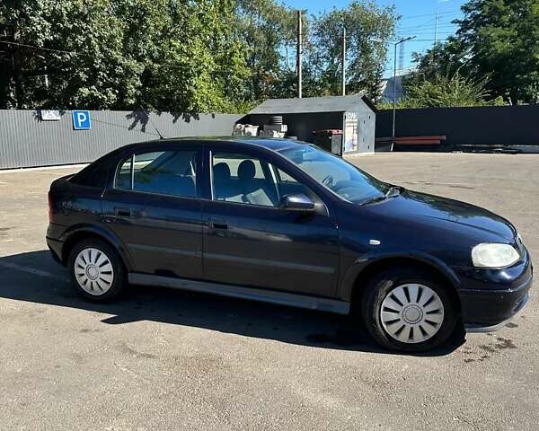 Синий Опель Астра, объемом двигателя 1.6 л и пробегом 202 тыс. км за 3000 $, фото 4 на Automoto.ua