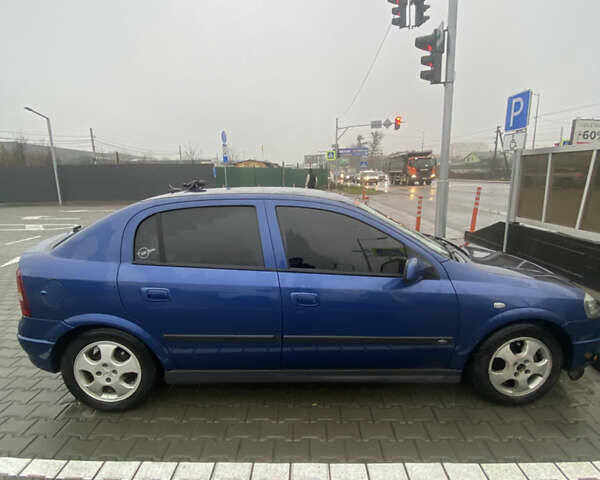 Синий Опель Астра, объемом двигателя 1.6 л и пробегом 239 тыс. км за 3550 $, фото 3 на Automoto.ua