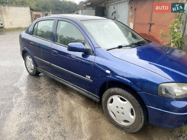 Синий Опель Астра, объемом двигателя 1.6 л и пробегом 180 тыс. км за 3200 $, фото 2 на Automoto.ua