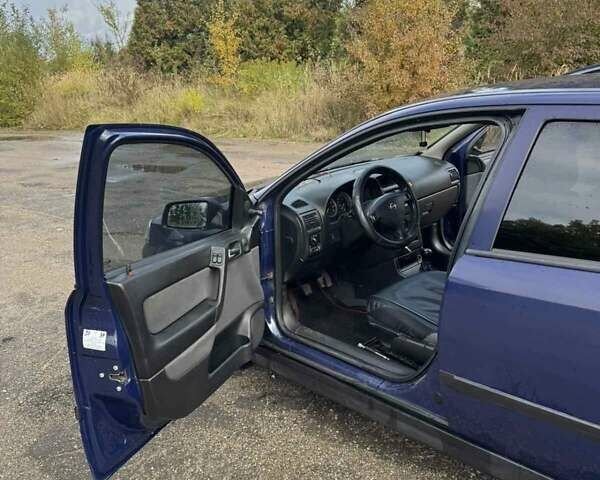 Синій Опель Астра, об'ємом двигуна 1.39 л та пробігом 320 тис. км за 2300 $, фото 4 на Automoto.ua