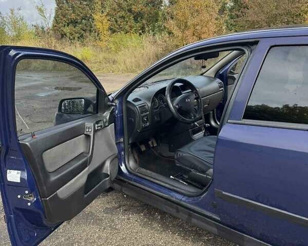 Синий Опель Астра, объемом двигателя 1.39 л и пробегом 320 тыс. км за 2300 $, фото 8 на Automoto.ua