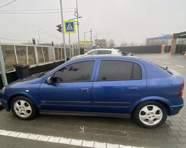 Синий Опель Астра, объемом двигателя 1.6 л и пробегом 239 тыс. км за 3550 $, фото 4 на Automoto.ua