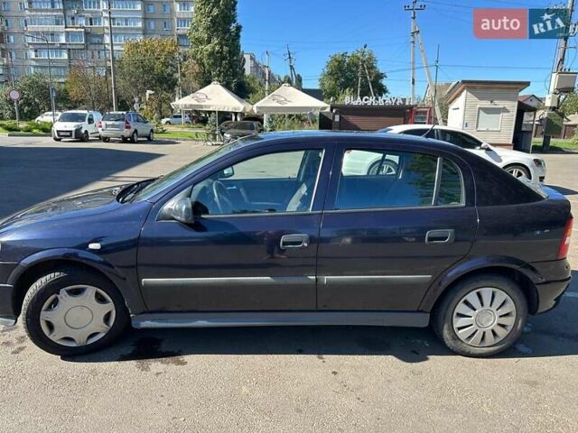 Синий Опель Астра, объемом двигателя 1.6 л и пробегом 202 тыс. км за 3000 $, фото 2 на Automoto.ua