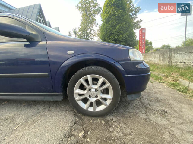 Синий Опель Астра, объемом двигателя 1.2 л и пробегом 264 тыс. км за 2800 $, фото 10 на Automoto.ua