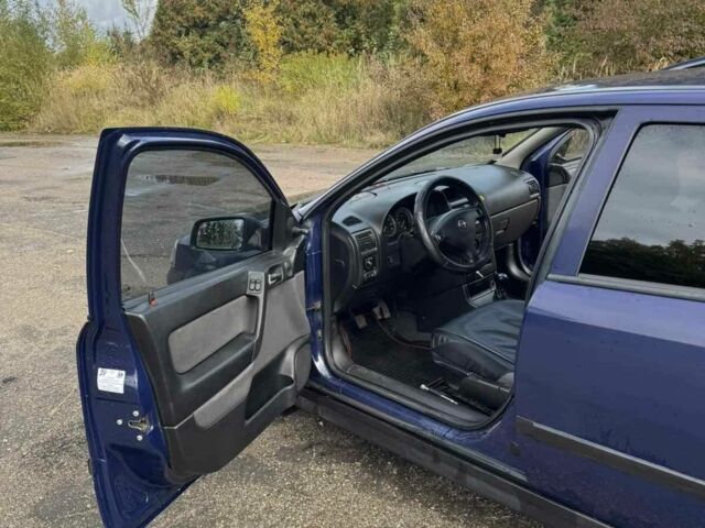 Синий Опель Астра, объемом двигателя 1.4 л и пробегом 320 тыс. км за 2300 $, фото 3 на Automoto.ua