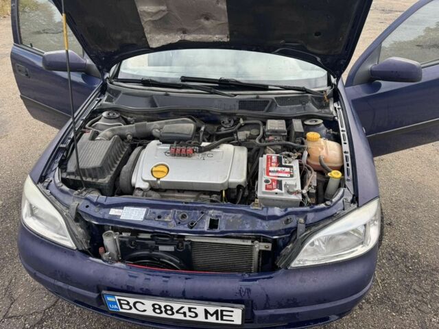 Синий Опель Астра, объемом двигателя 1.4 л и пробегом 320 тыс. км за 2300 $, фото 6 на Automoto.ua