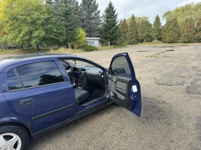 Синий Опель Астра, объемом двигателя 1.4 л и пробегом 320 тыс. км за 2300 $, фото 4 на Automoto.ua