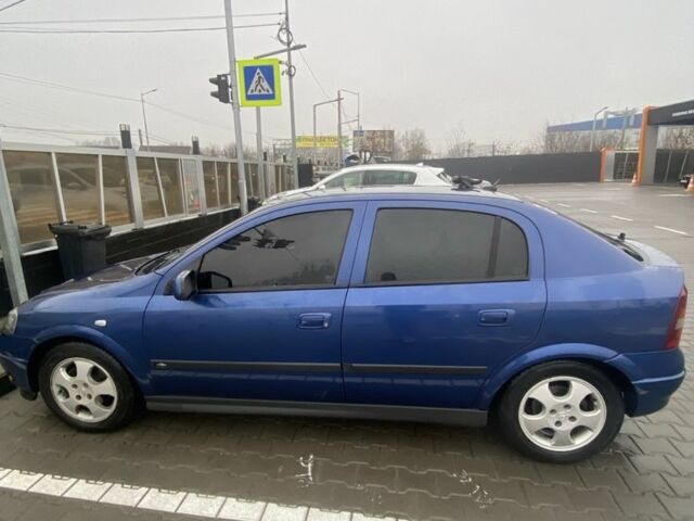 Синий Опель Астра, объемом двигателя 1.6 л и пробегом 239 тыс. км за 3550 $, фото 8 на Automoto.ua