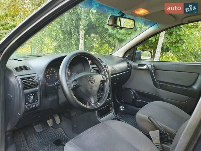 Синий Опель Астра, объемом двигателя 1.6 л и пробегом 270 тыс. км за 2200 $, фото 8 на Automoto.ua