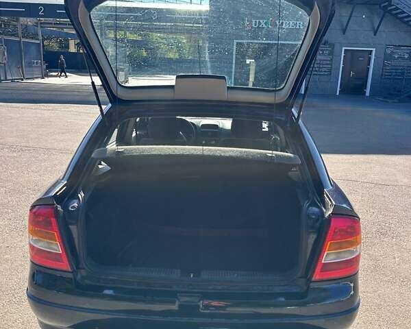 Синий Опель Астра, объемом двигателя 1.6 л и пробегом 202 тыс. км за 3000 $, фото 9 на Automoto.ua