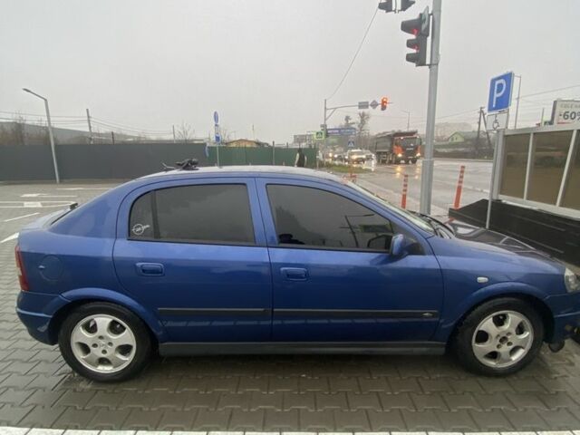 Синий Опель Астра, объемом двигателя 1.6 л и пробегом 239 тыс. км за 3550 $, фото 9 на Automoto.ua