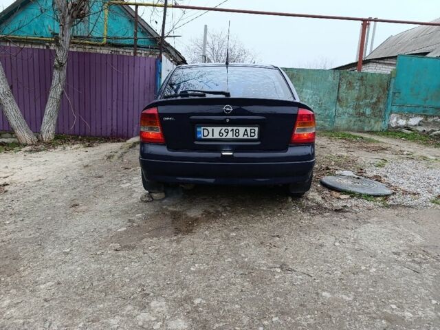 Синий Опель Астра, объемом двигателя 1.2 л и пробегом 340 тыс. км за 3300 $, фото 4 на Automoto.ua