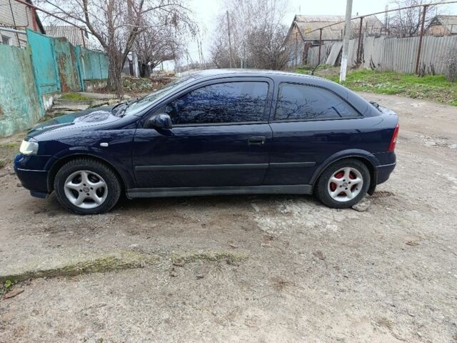 Синий Опель Астра, объемом двигателя 1.2 л и пробегом 340 тыс. км за 3300 $, фото 1 на Automoto.ua