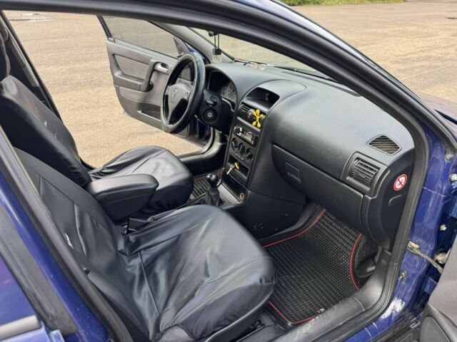 Синий Опель Астра, объемом двигателя 1.4 л и пробегом 320 тыс. км за 2300 $, фото 5 на Automoto.ua