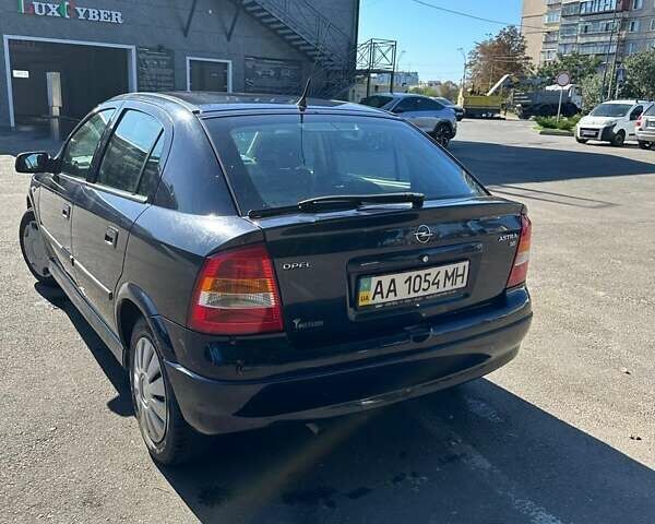 Синий Опель Астра, объемом двигателя 1.6 л и пробегом 202 тыс. км за 3000 $, фото 1 на Automoto.ua