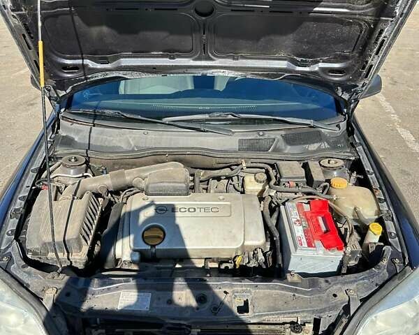 Синий Опель Астра, объемом двигателя 1.6 л и пробегом 202 тыс. км за 3000 $, фото 6 на Automoto.ua