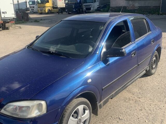 Синий Опель Астра, объемом двигателя 1.4 л и пробегом 240 тыс. км за 2300 $, фото 1 на Automoto.ua