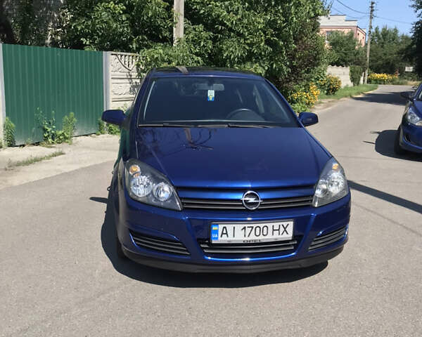 Синий Опель Астра, объемом двигателя 1.6 л и пробегом 212 тыс. км за 5600 $, фото 26 на Automoto.ua