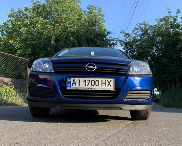 Синий Опель Астра, объемом двигателя 1.6 л и пробегом 212 тыс. км за 5600 $, фото 14 на Automoto.ua