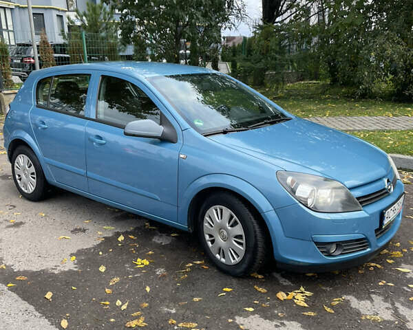 Синий Опель Астра, объемом двигателя 1.6 л и пробегом 210 тыс. км за 5600 $, фото 5 на Automoto.ua