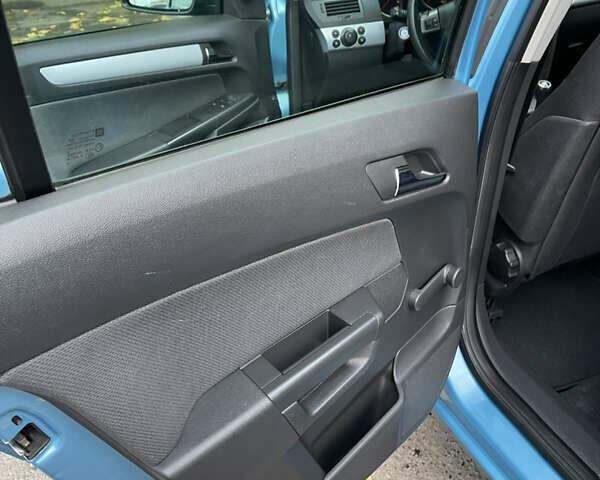 Синий Опель Астра, объемом двигателя 1.6 л и пробегом 210 тыс. км за 5600 $, фото 17 на Automoto.ua