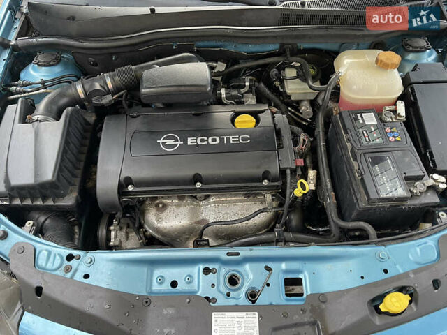 Синий Опель Астра, объемом двигателя 1.6 л и пробегом 210 тыс. км за 5600 $, фото 20 на Automoto.ua