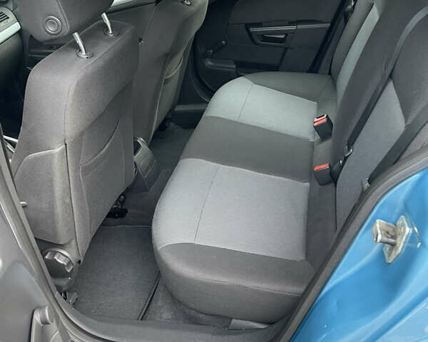 Синий Опель Астра, объемом двигателя 1.6 л и пробегом 210 тыс. км за 5600 $, фото 18 на Automoto.ua