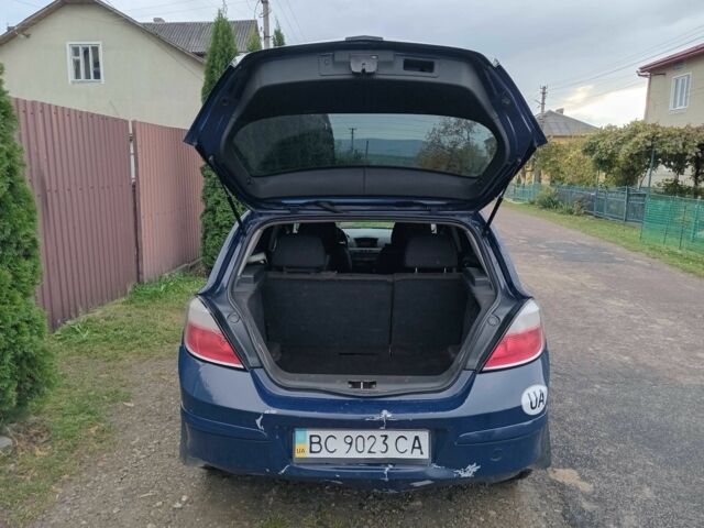 Синий Опель Астра, объемом двигателя 1.4 л и пробегом 345 тыс. км за 2800 $, фото 8 на Automoto.ua