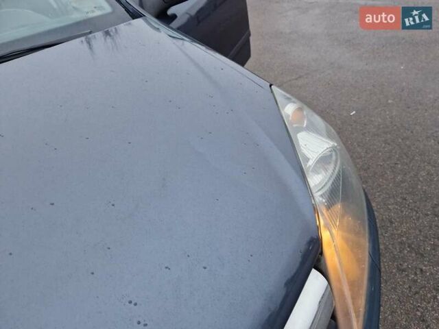 Синій Опель Астра, об'ємом двигуна 1.25 л та пробігом 275 тис. км за 3700 $, фото 12 на Automoto.ua