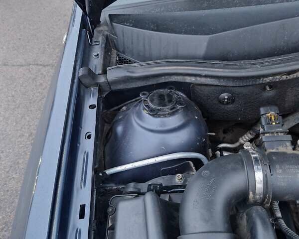 Синій Опель Астра, об'ємом двигуна 1.25 л та пробігом 275 тис. км за 3900 $, фото 29 на Automoto.ua