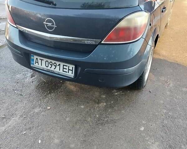 Синій Опель Астра, об'ємом двигуна 1.3 л та пробігом 267 тис. км за 4000 $, фото 5 на Automoto.ua