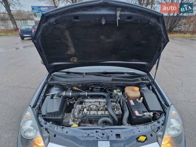 Синій Опель Астра, об'ємом двигуна 1.25 л та пробігом 275 тис. км за 3700 $, фото 25 на Automoto.ua