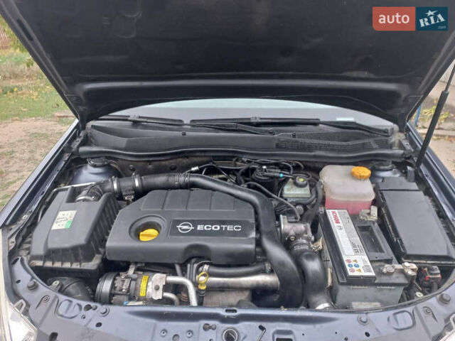 Синий Опель Астра, объемом двигателя 1.69 л и пробегом 282 тыс. км за 5999 $, фото 5 на Automoto.ua