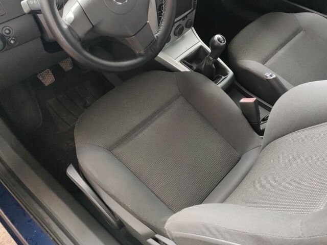 Синій Опель Астра, об'ємом двигуна 1.4 л та пробігом 206 тис. км за 5036 $, фото 2 на Automoto.ua