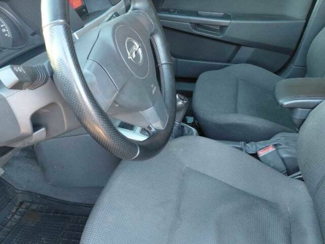 Синий Опель Астра, объемом двигателя 1.7 л и пробегом 224 тыс. км за 5600 $, фото 8 на Automoto.ua