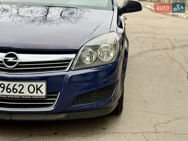 Синий Опель Астра, объемом двигателя 1.6 л и пробегом 240 тыс. км за 5999 $, фото 13 на Automoto.ua