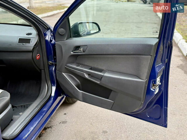 Синий Опель Астра, объемом двигателя 1.6 л и пробегом 240 тыс. км за 5999 $, фото 27 на Automoto.ua