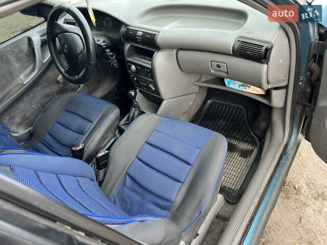 Синий Опель Астра, объемом двигателя 1.8 л и пробегом 321 тыс. км за 1250 $, фото 5 на Automoto.ua