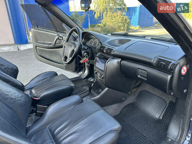 Синий Опель Астра, объемом двигателя 1.6 л и пробегом 229 тыс. км за 3999 $, фото 23 на Automoto.ua