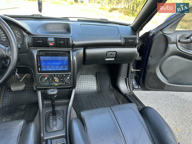 Синий Опель Астра, объемом двигателя 1.6 л и пробегом 229 тыс. км за 3999 $, фото 27 на Automoto.ua