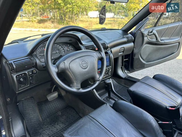 Синий Опель Астра, объемом двигателя 1.6 л и пробегом 229 тыс. км за 3999 $, фото 16 на Automoto.ua