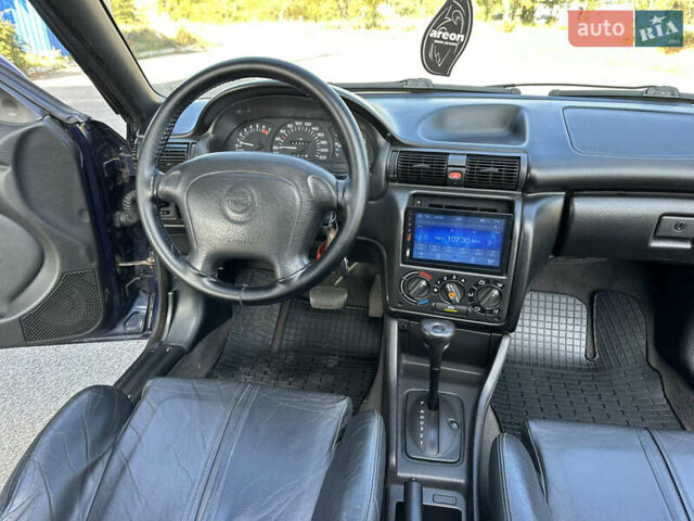 Синий Опель Астра, объемом двигателя 1.6 л и пробегом 229 тыс. км за 3999 $, фото 26 на Automoto.ua