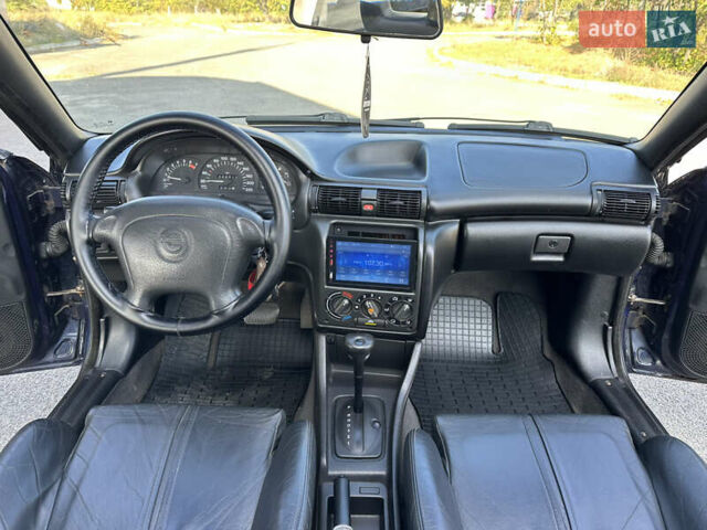 Синий Опель Астра, объемом двигателя 1.6 л и пробегом 229 тыс. км за 3999 $, фото 28 на Automoto.ua