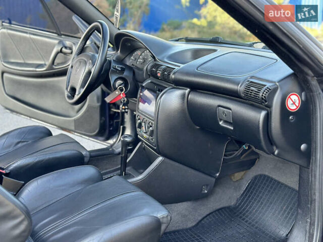 Синий Опель Астра, объемом двигателя 1.6 л и пробегом 229 тыс. км за 3999 $, фото 21 на Automoto.ua