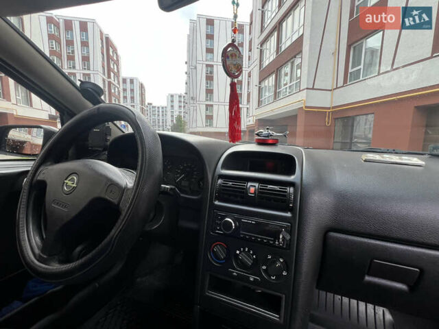 Синий Опель Астра, объемом двигателя 1.6 л и пробегом 340 тыс. км за 2600 $, фото 33 на Automoto.ua