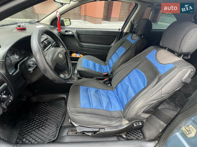 Синий Опель Астра, объемом двигателя 1.6 л и пробегом 340 тыс. км за 2600 $, фото 22 на Automoto.ua