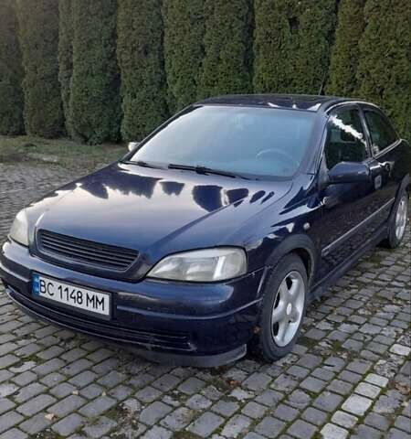 Синий Опель Астра, объемом двигателя 1.6 л и пробегом 375 тыс. км за 2100 $, фото 3 на Automoto.ua