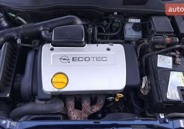 Синий Опель Астра, объемом двигателя 1.6 л и пробегом 375 тыс. км за 2100 $, фото 5 на Automoto.ua