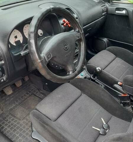 Синий Опель Астра, объемом двигателя 1.6 л и пробегом 375 тыс. км за 2100 $, фото 4 на Automoto.ua