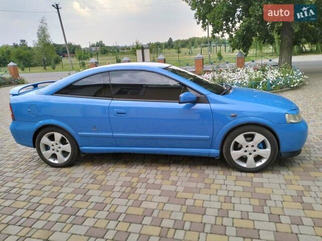 Синий Опель Астра, объемом двигателя 1.8 л и пробегом 290 тыс. км за 4100 $, фото 2 на Automoto.ua